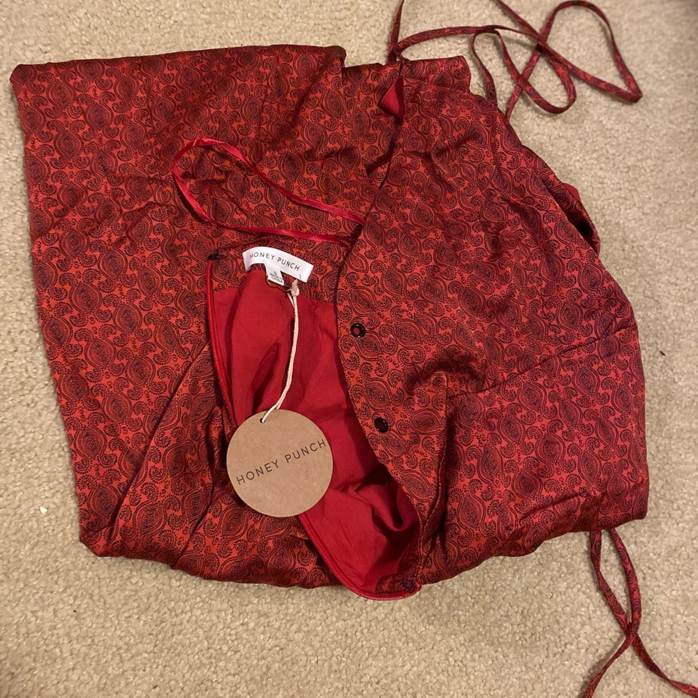 Honey punch size small -brand new with tags. Super cute romper.